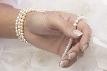 Pearls in her hands
