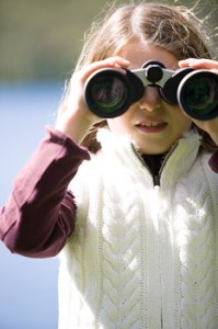 Girl and binoculars