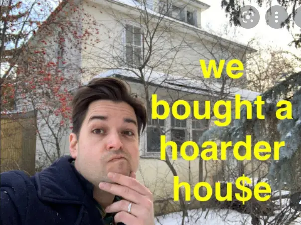 Alex in front of a hoarder's house that he purchased